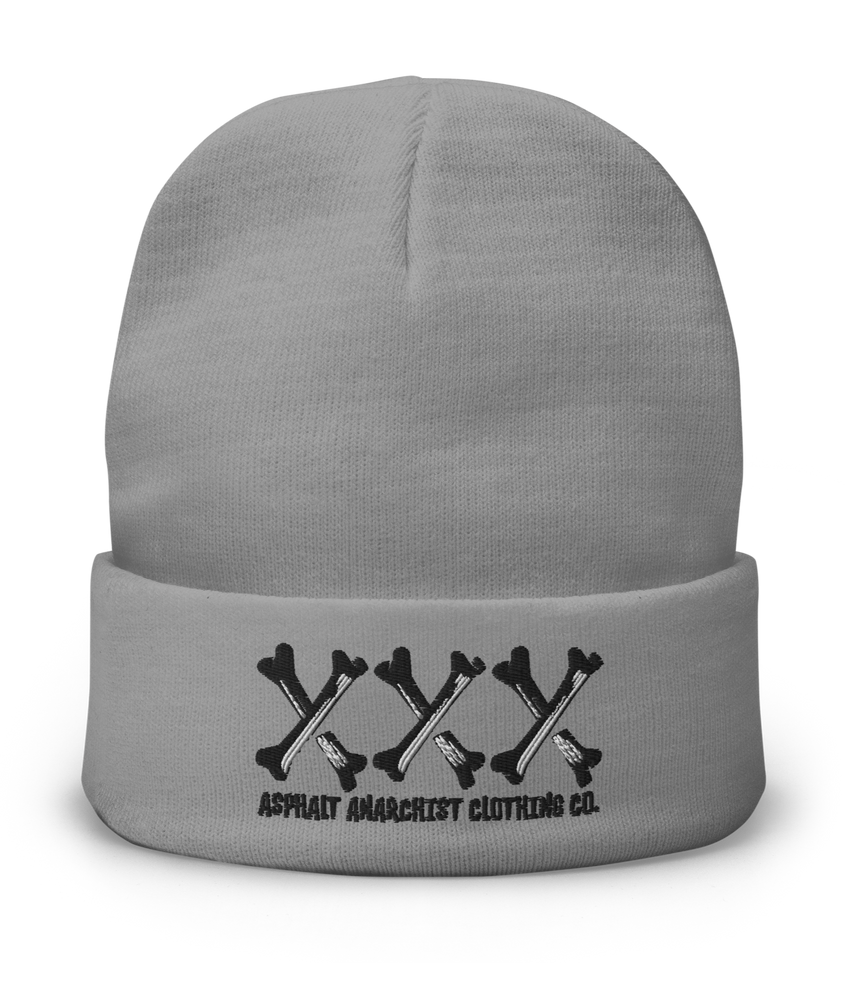 
                  
                    Front view of the Bone Grinder X-Bone Beanie in gray from Asphalt Anarchist—embroidered triple X’s in bone font with stitched brand detail. Misfit headwear. AI-generated image.
                  
                