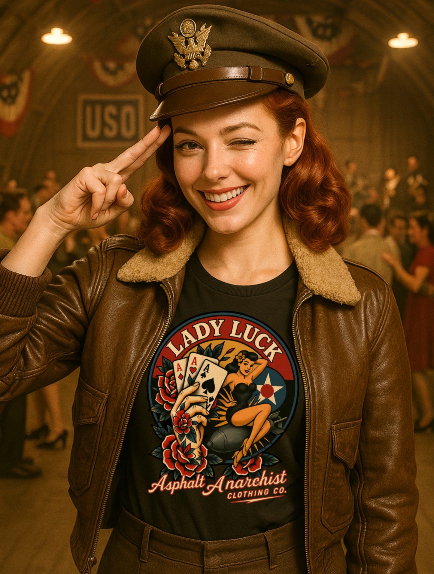 
                  
                    A redhead rockabilly bombshell in a bomber jacket and air force officer's hat enjoys a USO party before the mission. She wears the Lady Luck Soft-Style Tee in black from Asphalt Anarchist Clothing Co.—graphic features a bold  pin-up riding a bomb mid-flight, clenching three aces in her fist, framed by classic rose flash art inspired by WW2 era B-17 nose cone artwork. Semi-fitted women’s cut, lightweight cotton, flat-lay styling.
AI-generated image
                  
                