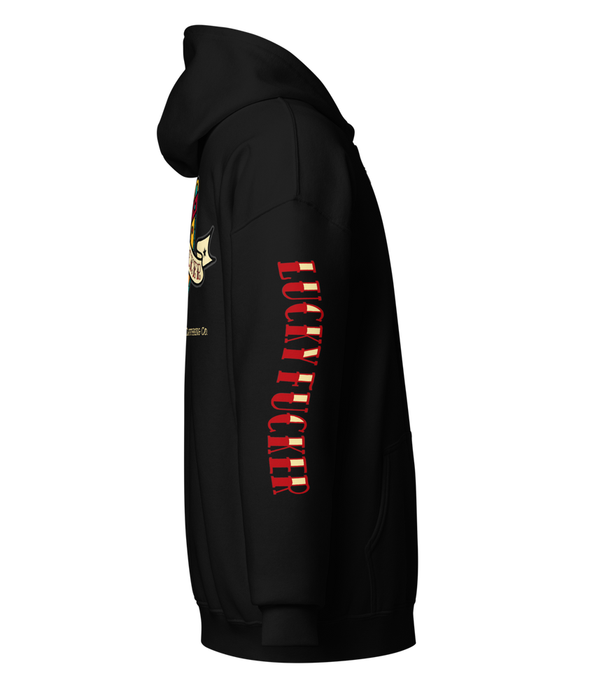 
                  
                    Right side view of the Lucky Fucker Heavy Zipper Hoodie in black by Asphalt Anarchist Clothing Co. Featuring full-back American Traditional tattoo-style Lucky Fucker banner across a horseshoe artwork and stitched sleeve details. AI Generated Image.
                  
                