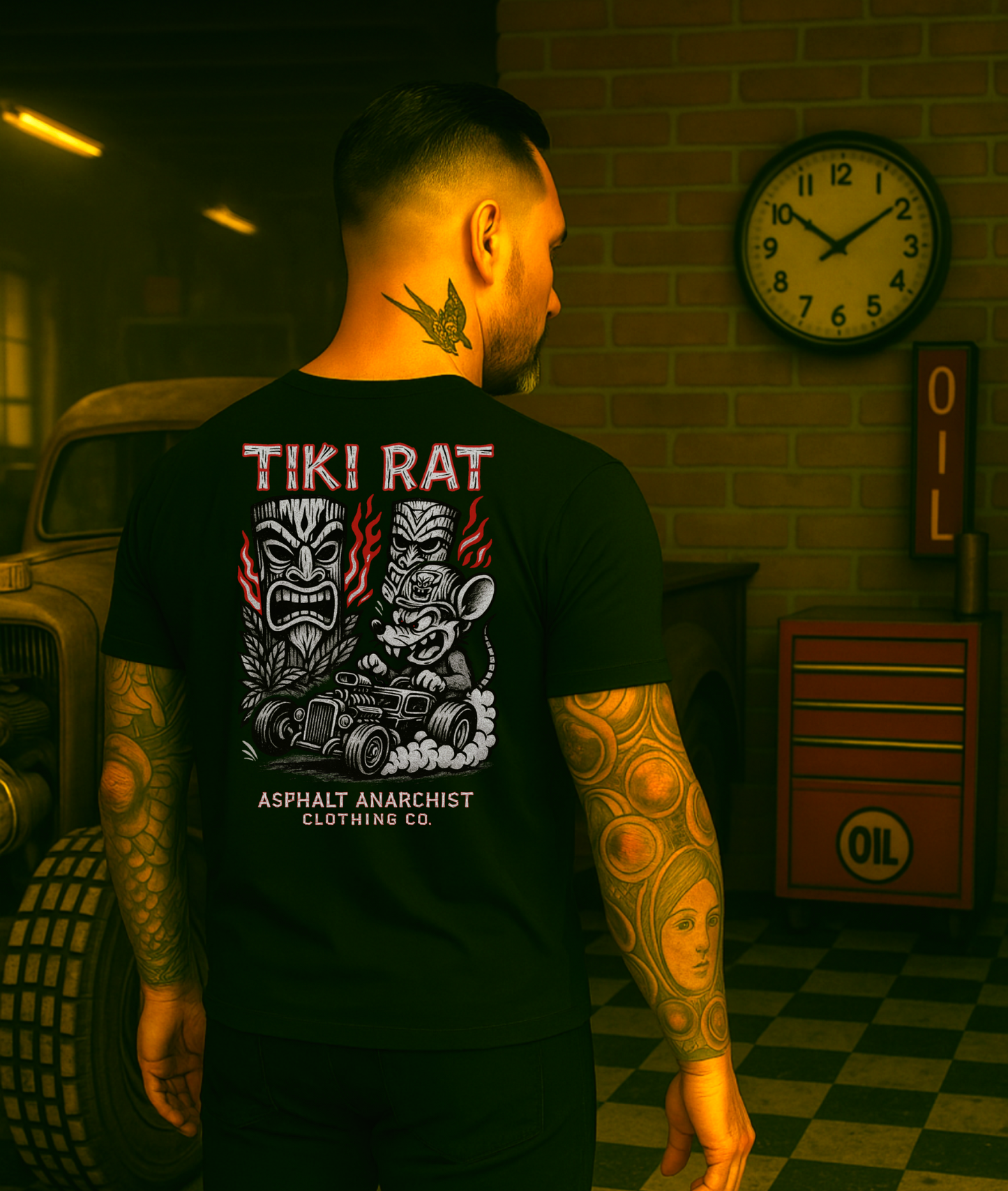 
                  
                    Back of Tiki Rat shirt with bold lowbrow art—flame-spitting hot rod, tiki statues, and wild-eyed rat driver—worn by a tattooed man restoring a classic car in an old-school garage. Asphalt Anarchist Clothing Co. OLD SKOOL HOT ROD APPAREL Custom fueled, never factory filled. Image is AI-generated.

                  
                