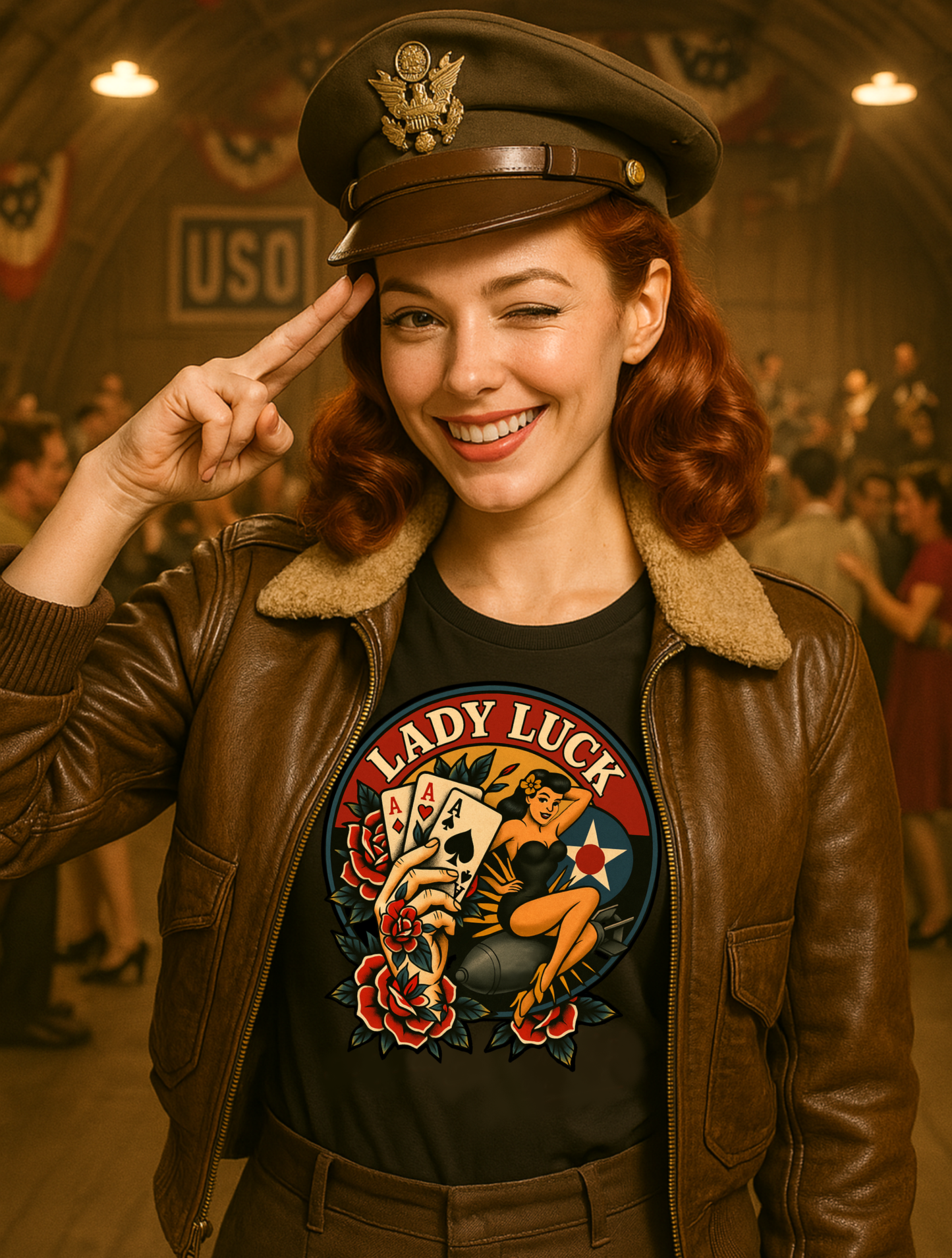 
                  
                    A redhead rockabilly bombshell in a bomber jacket and air force officer's hat enjoys a USO party before the mission. She wears the Lady Luck Soft-Style Tee in black from Asphalt Anarchist Clothing Co.—graphic features a bold  pin-up riding a bomb mid-flight, clenching three aces in her fist, framed by classic rose flash art inspired by WW2 era B-17 nose cone artwork. Semi-fitted women’s cut, lightweight cotton, flat-lay styling.
AI-generated image
                  
                