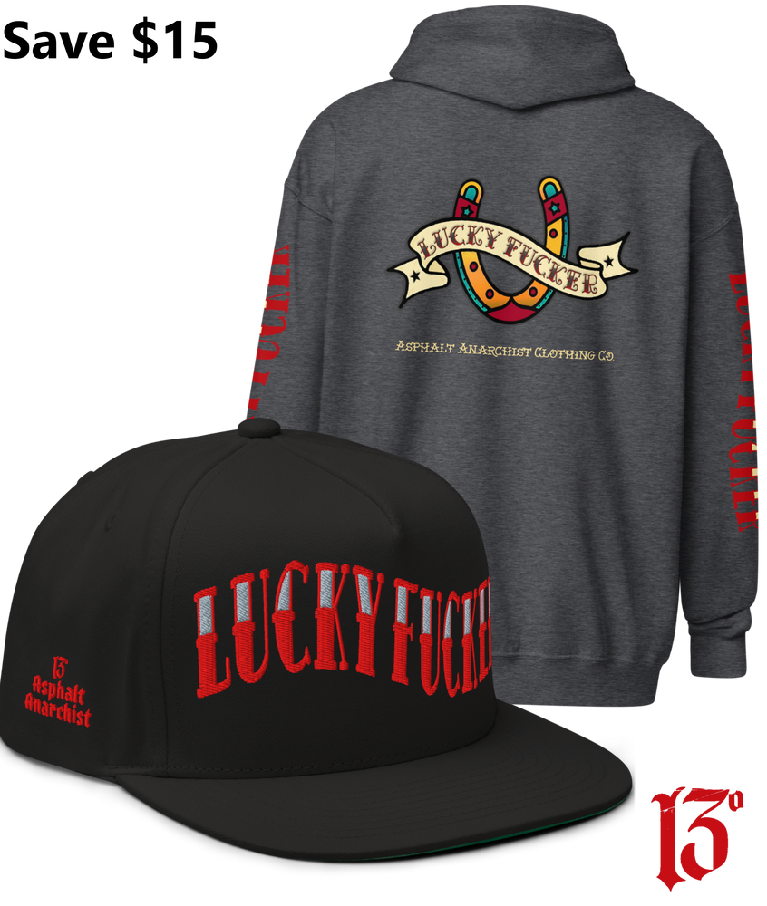 
                  
                    Back view of the Lucky Fucker Heavy Zipper Hoodie in gray and the Lucky Fucker Snapback in black by Asphalt Anarchist Clothing Co. Featuring American traditional tattoo horseshoe & banner artwork and sailor font details. AI Generated Image.
                  
                