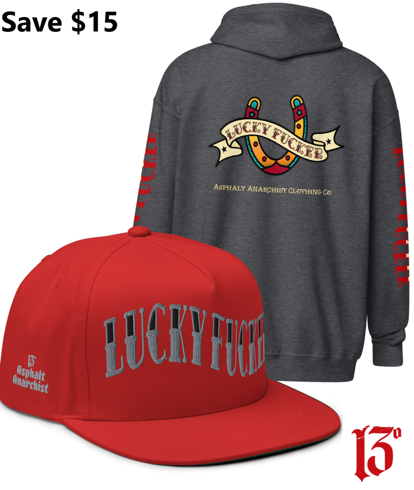 
                  
                    Back view of the Lucky Fucker Heavy Zipper Hoodie in gray and the Lucky Fucker Snapback in red by Asphalt Anarchist Clothing Co. Featuring American traditional tattoo horseshoe & banner artwork and sailor font details. AI Generated Image.
                  
                