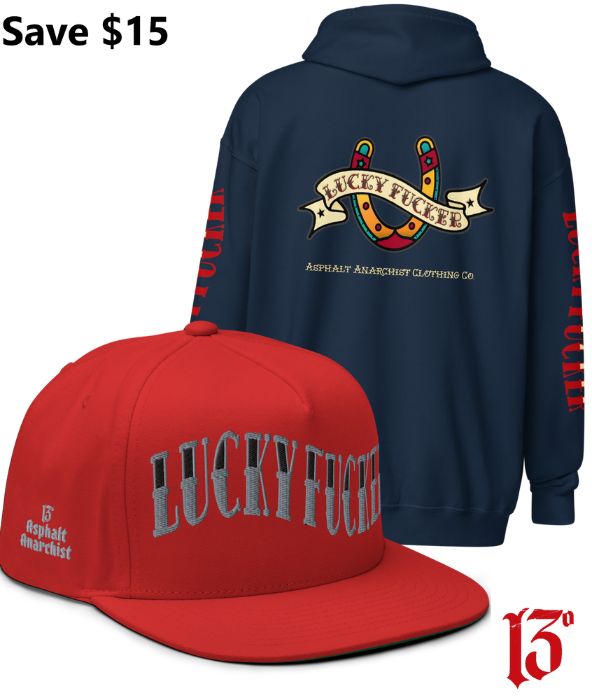 
                  
                    Back view of the Lucky Fucker Heavy Zipper Hoodie in navy and the Lucky Fucker Snapback in red by Asphalt Anarchist Clothing Co. Featuring American traditional tattoo horseshoe & banner artwork and sailor font details. AI Generated Image.
                  
                