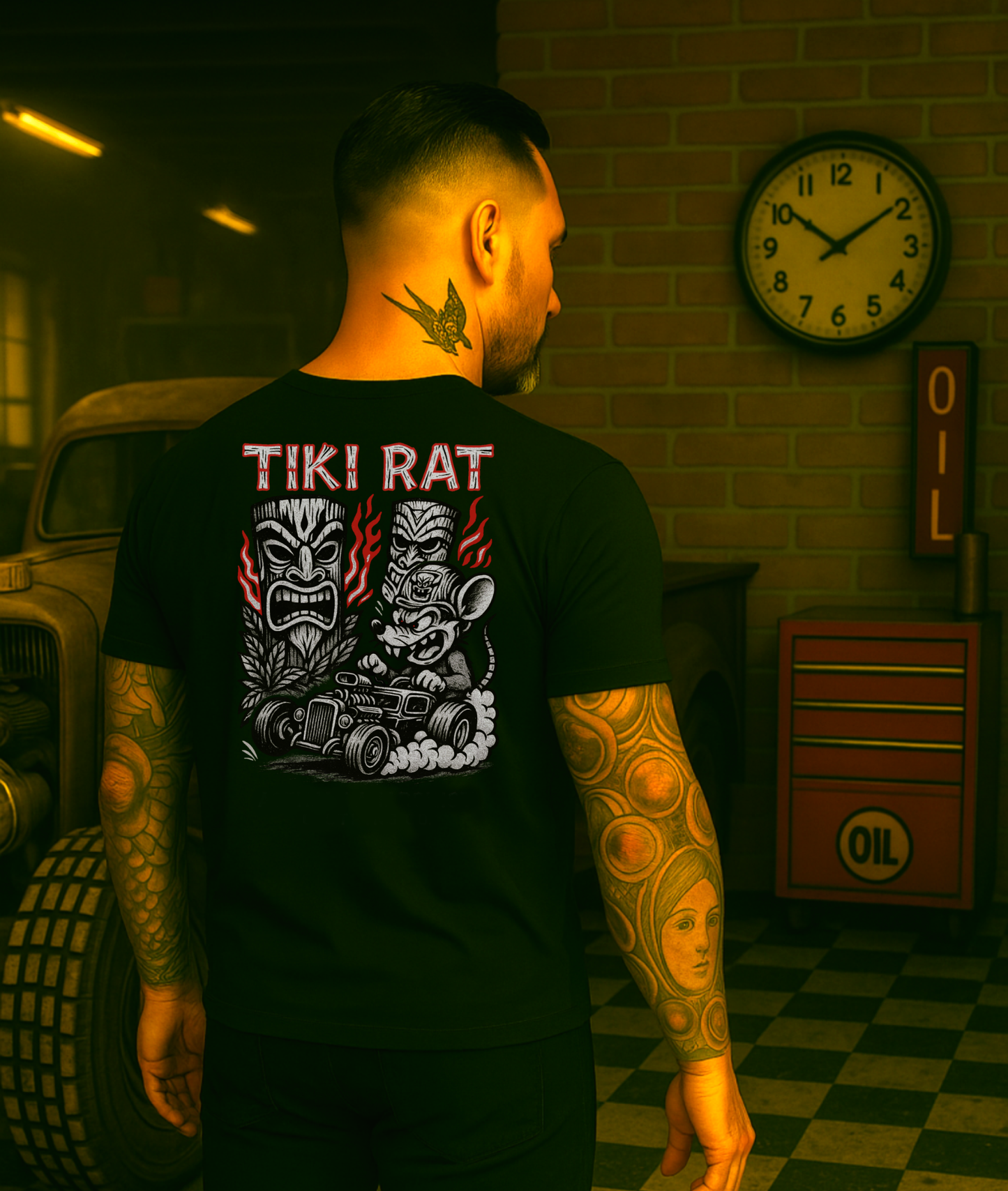 
                  
                    Back of Tiki Rat shirt with bold lowbrow art—flame-spitting hot rod, tiki statues, and wild-eyed rat driver—worn by a tattooed man restoring a classic car in an old-school garage. Asphalt Anarchist Clothing Co. OLD SKOOL HOT ROD APPAREL Custom fueled, never factory filled. Image is AI-generated.
                  
                